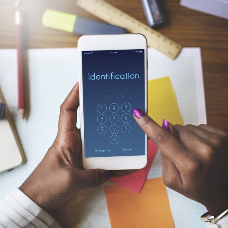 Person verifying identity via digital interface, representing identity validation and KYC in casino gaming